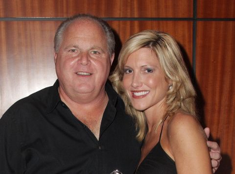 Rush Limbaugh poses a picture with his wife Kathryn Adams.